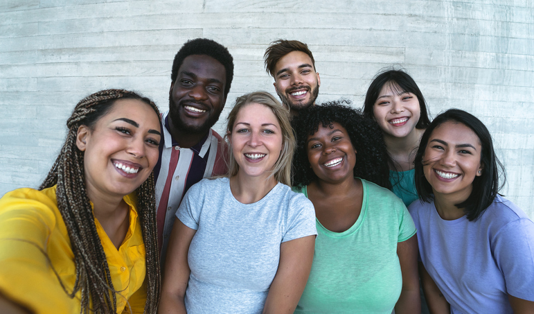 Group of diverse young people smiling