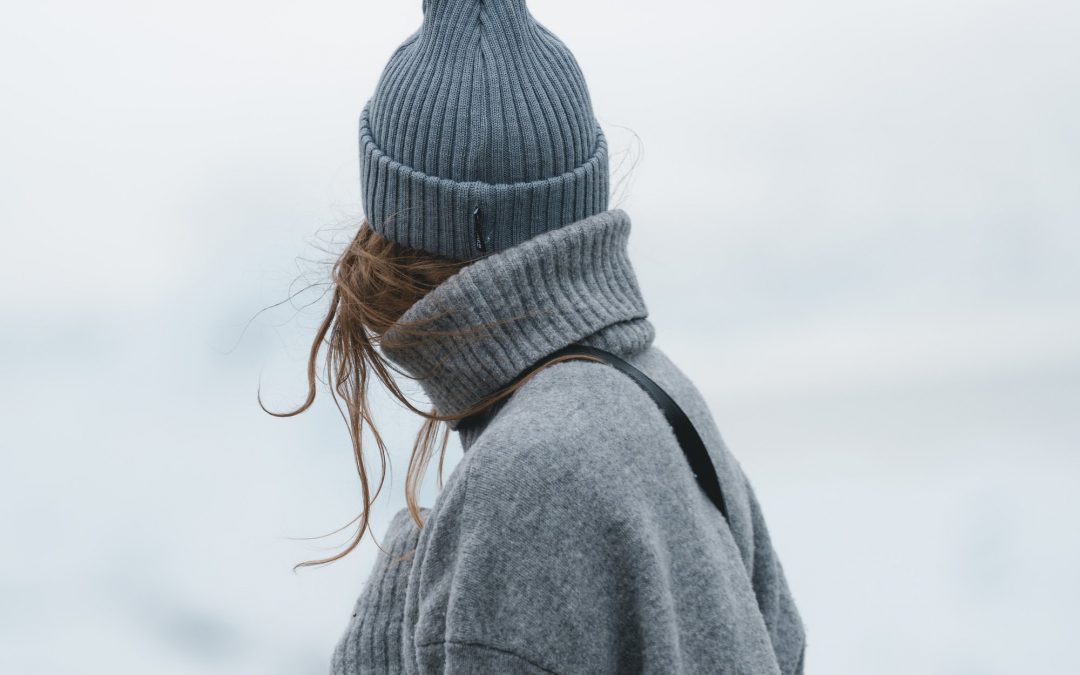 back view of woman with a beanie during winter