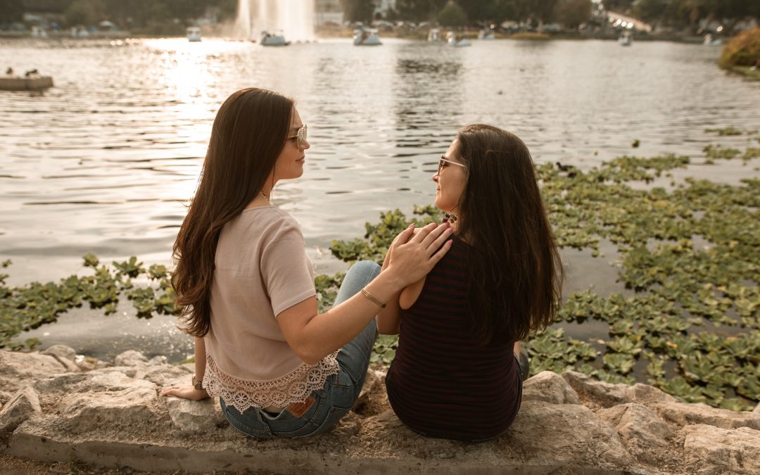 two girls by the lake